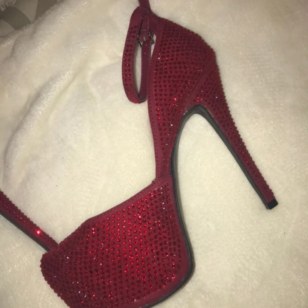 Red rhinestone pumps
